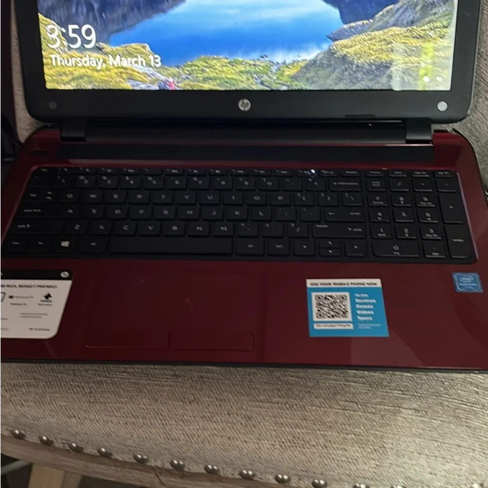 HP Red and Black Laptop with Full Keyboard and Modern Design